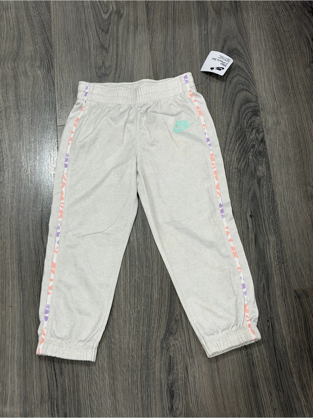 Nike Kids Light Cream Joggers with Pink & Purple Side Trim